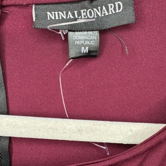 Size medium, maroon stretchy jumpsuit with pockets and belt - Picture 4 of 6